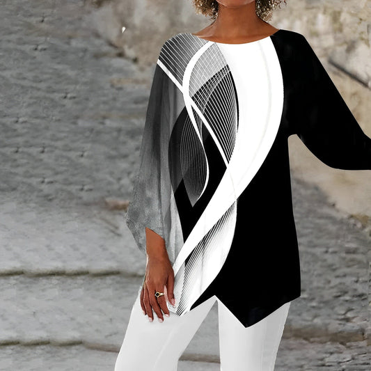 Charline Chic | Kunstnerisk sort-hvid top med asymmetrisk kant